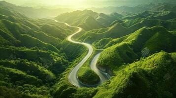 Aerial view of winding road in the mountains photo