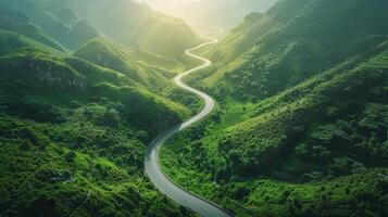 Aerial view of winding road in the mountains photo