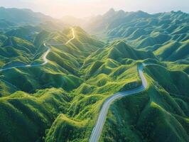 Aerial view of a winding road in the mountains photo