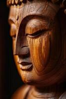 Close Up of a Wooden Statue of Buddha photo
