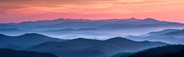 Majestic Mountain Range Glowing in Sunset Light photo