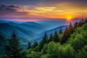 Sun Setting Over Mountain Range photo