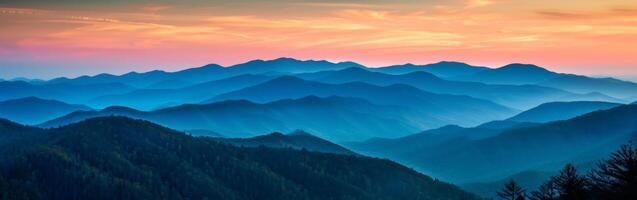 Majestic Mountain Range at Sunset photo