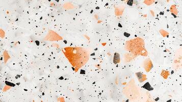 White Wall With Orange and Black Speckles photo