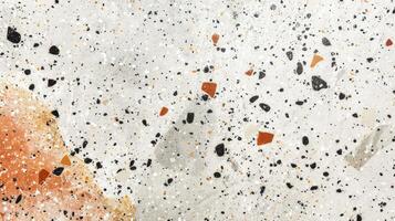 Close-Up of White and Black Speckled Surface photo