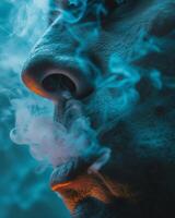 Man Smoking Cigarette With Blue Smoke photo