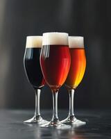 Three Glasses of Beer on Table photo