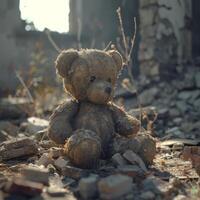 Brown Teddy Bear Sitting on Pile of Rubble photo