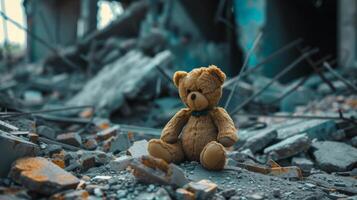 Brown Teddy Bear Sitting on Rubble photo
