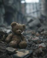 Brown Teddy Bear Sitting on Rubble photo
