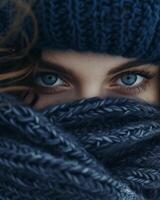 Close Up of Person Wearing Blue Hat and Scarf photo