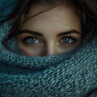 Woman With Blue Eyes Wrapped in Blanket photo