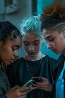 Three Girls Engrossed in Cell Phone photo