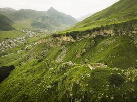 Ascending view Hidden gem - Arsha fortress built in XVI century - defense fortress in medieval Khevi. Things to see. KAzbegi national park. Sightseeing Georgia historical landmarks photo