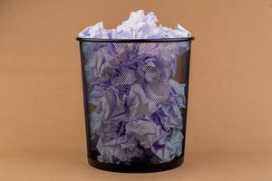 Trash and unused scraps of paper, malfunctions and unnecessary discards from the documentation of office work. photo