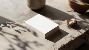 Stack of blank cards mockup placed on textured stone surface. Calm and meditation atmosphere. Businesscard template advertising image. Stationery mock up product photorealistic photo