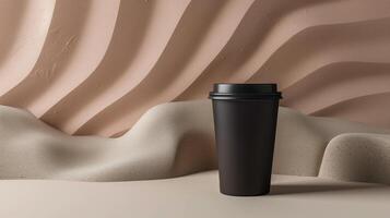 Black coffee cup mockup stands on textured surface with wavy patterns. Modern minimalist backdrop. Coffeecup template advertising image. Takeout disposable mock up product photorealistic photo