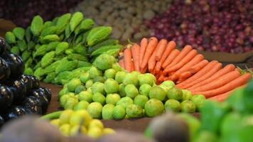 Fresh vegetables in vegetables market.Seller displayed colorful vegetables in a stall. Many varieties of colorful vegetables. video