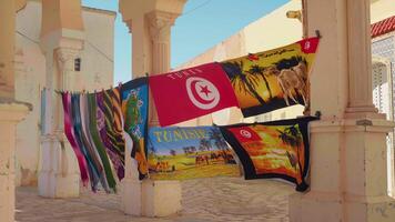 Personalized Towels with Tunisian accent hung on string in the middle of old building in Africa. video