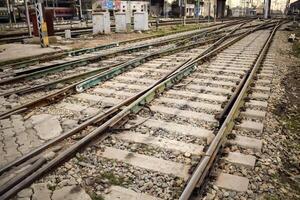 View of train Railway Tracks from the middle during daytime at Kathgodam railway station in India, Train railway track view, Indian Railway junction, Heavy industry photo