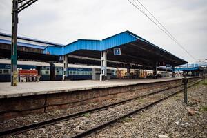 View of train Railway Tracks from the middle during daytime at Kathgodam railway station in India, Train railway track view, Indian Railway junction, Heavy industry photo