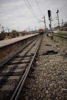 View of train Railway Tracks from the middle during daytime at Kathgodam railway station in India, Train railway track view, Indian Railway junction, Heavy industry photo