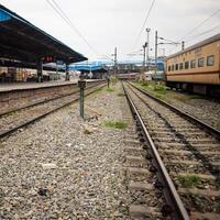 View of train Railway Tracks from the middle during daytime at Kathgodam railway station in India, Train railway track view, Indian Railway junction, Heavy industry photo