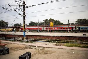 View of train Railway Tracks from the middle during daytime at Kathgodam railway station in India, Train railway track view, Indian Railway junction, Heavy industry photo