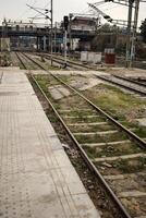 View of train Railway Tracks from the middle during daytime at Kathgodam railway station in India, Train railway track view, Indian Railway junction, Heavy industry photo
