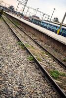 View of train Railway Tracks from the middle during daytime at Kathgodam railway station in India, Train railway track view, Indian Railway junction, Heavy industry photo