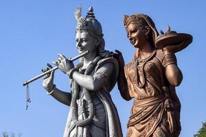 Big statue of Lord Radha Krishna near Delhi International airport, Delhi, India, Lord Krishna and Radha big statue touching sky at main highway Mahipalpur, Delhi photo