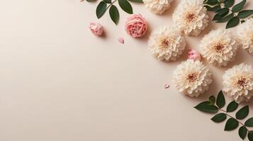 flowers and leaves creative frame on a background. Top view, flat lay. Floral composition and design photo