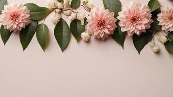 flowers and leaves creative frame on a background. Top view, flat lay. Floral composition and design photo