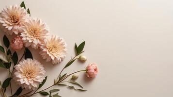 flowers and leaves creative frame on a background. Top view, flat lay. Floral composition and design photo