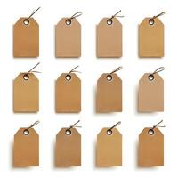 Set of twelve blank brown tags with strings on a white background photo