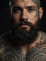a man with tattoos and a beard photo
