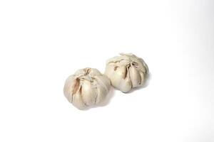 Two Garlic isolated. Raw garlic with segments isolated on white background photo