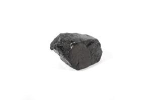 coal on a white background. Isolated on white. Coal can be a fuel that is cheaper than others photo