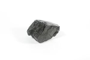 coal on a white background. Isolated on white. Coal can be a fuel that is cheaper than others photo