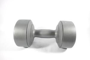 One gray color dumbbells or barbell isolated on white background. Dumbbells on white background photo