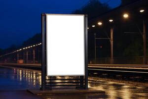 Blank white billboard stand or mupi mockup at train station background after rain. Generate Ai photo