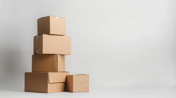 A stack of cardboard boxes is piled on top of each other photo