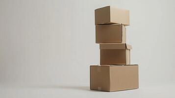 A stack of cardboard boxes is piled on top of each other photo