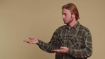 Man pointing empty place, advertising area for commercial text, copy space for goods promotion video