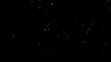 Small red particles chaotically moving up on black background. Hot sparks from the open fire flying into the night sky. Abstract CGI motion design video