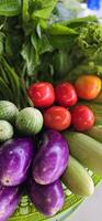 assortment of fresh organic vegetables and fruits in colorful arrangement , good for cooking multimedia creative content creation photo