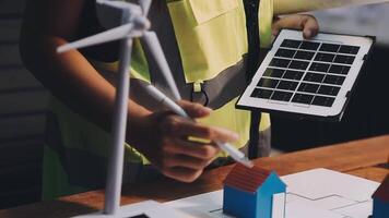 Selective focus, Asian female architect or engineer Currently considering materials for designing modern condominiums. Asian female architect or engineer Sit and analyze, design projects in the office video