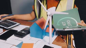 Selective focus, Asian female architect or engineer Currently considering materials for designing modern condominiums. Asian female architect or engineer Sit and analyze, design projects in the office video