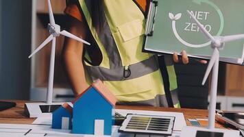 Selective focus, Asian female architect or engineer Currently considering materials for designing modern condominiums. Asian female architect or engineer Sit and analyze, design projects in the office video