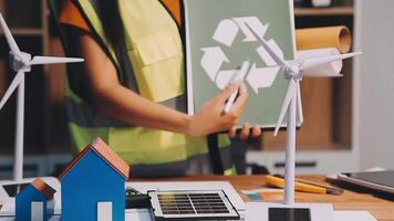 Selective focus, Asian female architect or engineer Currently considering materials for designing modern condominiums. Asian female architect or engineer Sit and analyze, design projects in the office video